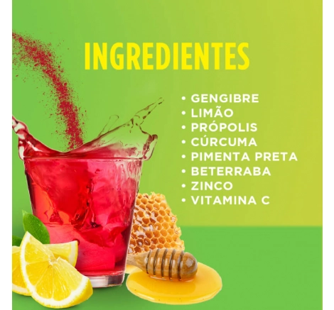 Copo cheio com Desinshot Shot Matinal e os seus ingredientes.