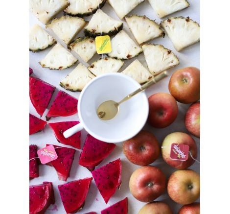 Ingredientes principais dos produtos da linha Desinchá Sabores: pitaya, maçã e abacaxi